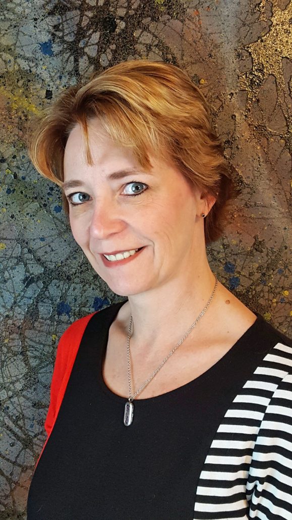 A Portrait Picture of the Owner of the Studio and Main Tattoo Artist, Renee