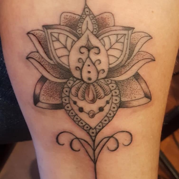 Tattoo of a detailed lotus flower