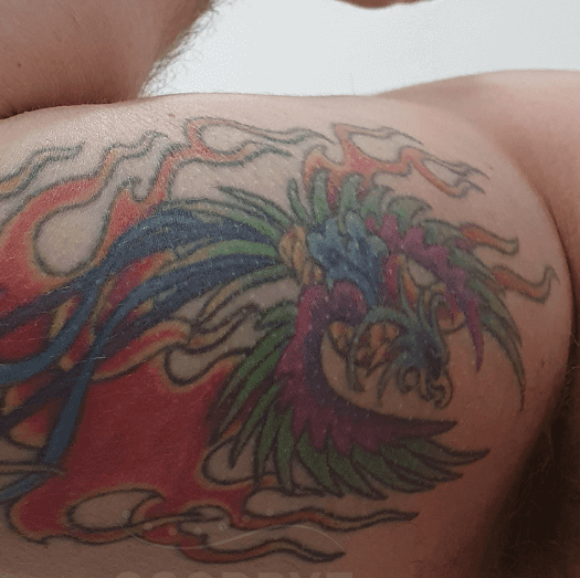 colorful firey flower tattoo