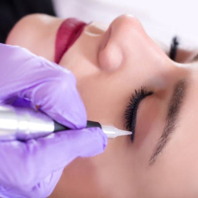 permanent eyeliner being applied