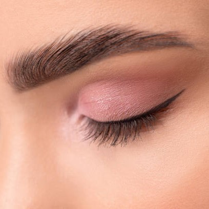 finished product of permanent eyebrow and eyeliner makeup