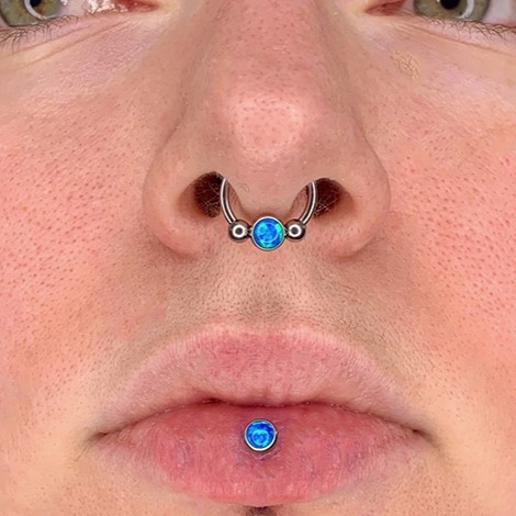 septum nose piercing and botton lip piercing