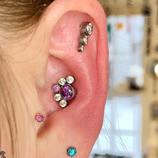 conch, tragus, flat, and lobe ear piercings